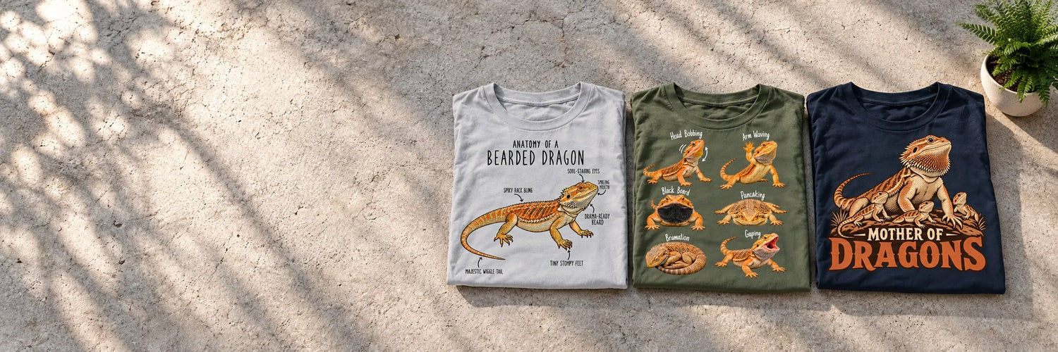 Three folded bearded dragon T-shirts on sunlit concrete: Anatomy of a Bearded Dragon, a bearded dragon behavior guide and Mother of Dragons